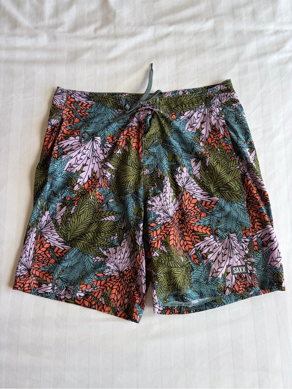 SAXX- size 36 Betawave Swim Boardshorts in the Sub Tropic Multi color pattern.
